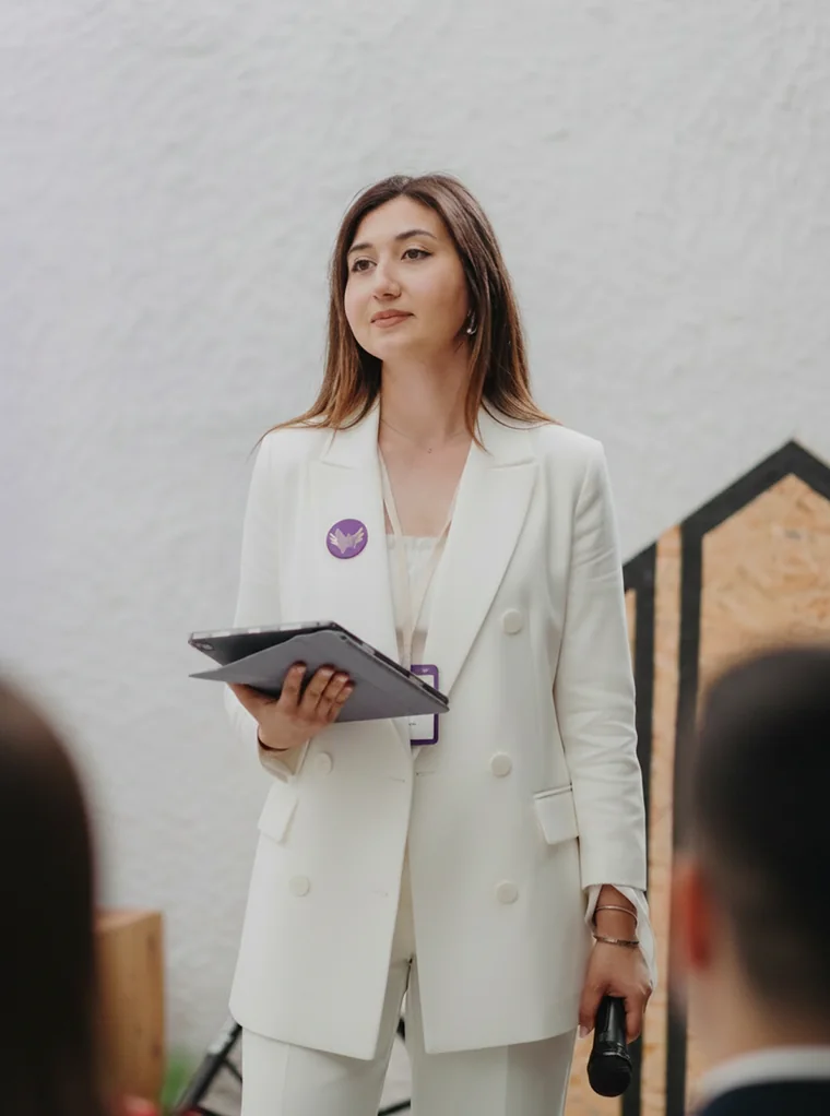 Ece Bozca speaking at an event